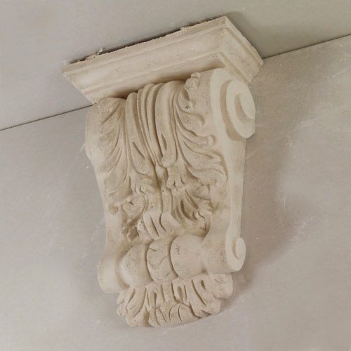 Short ornate corbel with leaf designs from heritage plaster services